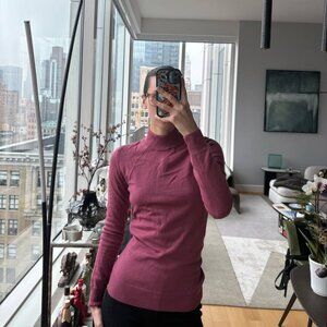 Wool turtleneck sweater in Cordovan